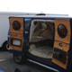 Illustration for article titled The Coolest Car At The Monterey Motorsports Reunion Is This Custom Van With an F1 Car